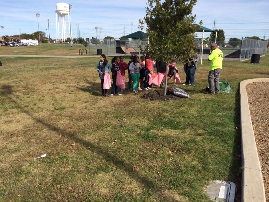 Kids gathered on a lawn